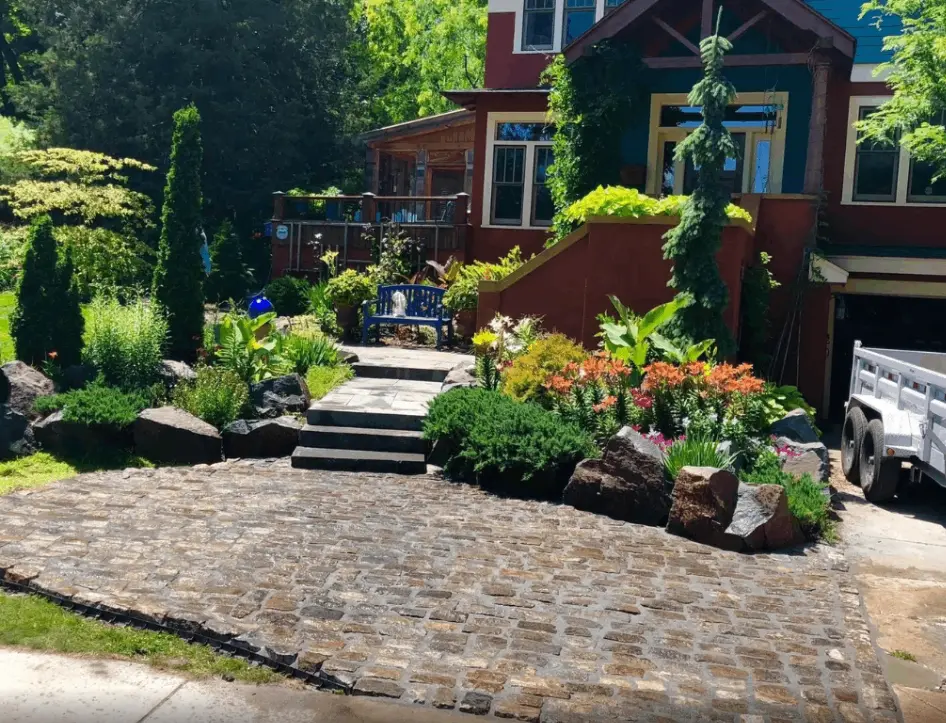 Cobblestone, rocks and muclhing in lakeville landscaping mn